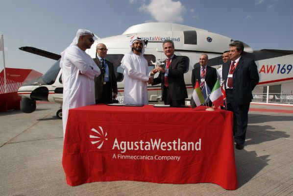 AgustaWestland and Falcon Aviation Services signing for two AW169 helicopters at the Dubai Air Show 2013