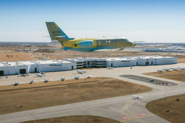 prototype Cessna Citation Latitude overflying the factory