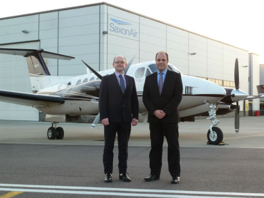 Christopher Mace, group commercial director (left) and Alex Durand, CEO in front of the King Air 350